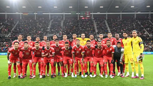 MAINZ, GERMANY – MARCH 25: The Peru team line up on the pitch prior to the international friendly match between Germany and Peru at MEWA Arena on March 25, 2023 in Mainz, Germany. (Photo by Stuart Franklin/Getty Images)