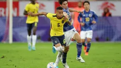 DUESSELDORF, GERMANY - SEPTEMBER 27: Byron Castillo of Ecuador battles for possession with Ao Tanaka of Japan during the international friendly match between Japan and Ecuador at Merkur Spiel-Arena on September 27, 2022 in Duesseldorf, Germany. (Photo by Alex Grimm/Getty Images)