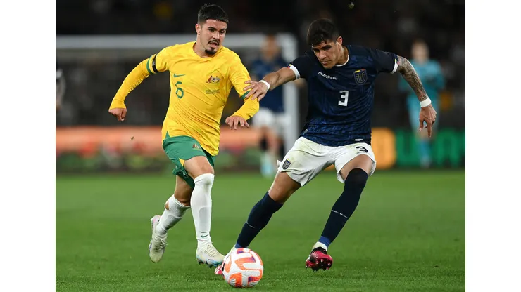 MELBOURNE, AUSTRALIA - MARCH 28: Marco Tilio of the Socceroos and Piero Hincapie of Ecuador compete for the ball during the International Friendly match between the Australia Socceroos and Ecuador at Marvel Stadium on March 28, 2023 in Melbourne, Australia. (Photo by Quinn Rooney/Getty Images)