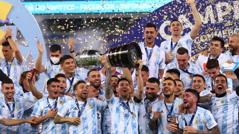 RIO DE JANEIRO, BRAZIL - JULY 10: Lionel Messi of Argentina lifts the trophy with teammates after winning the final of Copa America Brazil 2021 between Brazil and Argentina at Maracana Stadium on July 10, 2021 in Rio de Janeiro, Brazil. (Photo by Buda Mendes/Getty Images)