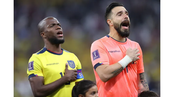 AL KHOR, QATAR - NOVEMBER 20: Angel Mena (l) and Hernan Galindez (r) of Ecuador during the national anthems ahead of the FIFA World Cup Qatar 2022 Group A match between Qatar and Ecuador at Al Bayt Stadium on November 20, 2022 in Al Khor, Qatar. (Photo by Michael Steele/Getty Images)
