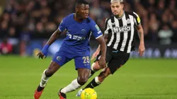 LONDON, ENGLAND - DECEMBER 19: Moises Caicedo of Chelsea runs ahead of Bruno Guimaraes of Newcastle United during the Carabao Cup Quarter Final match between Chelsea and Newcastle United at Stamford Bridge on December 19, 2023 in London, England. (Photo by Julian Finney/Getty Images)