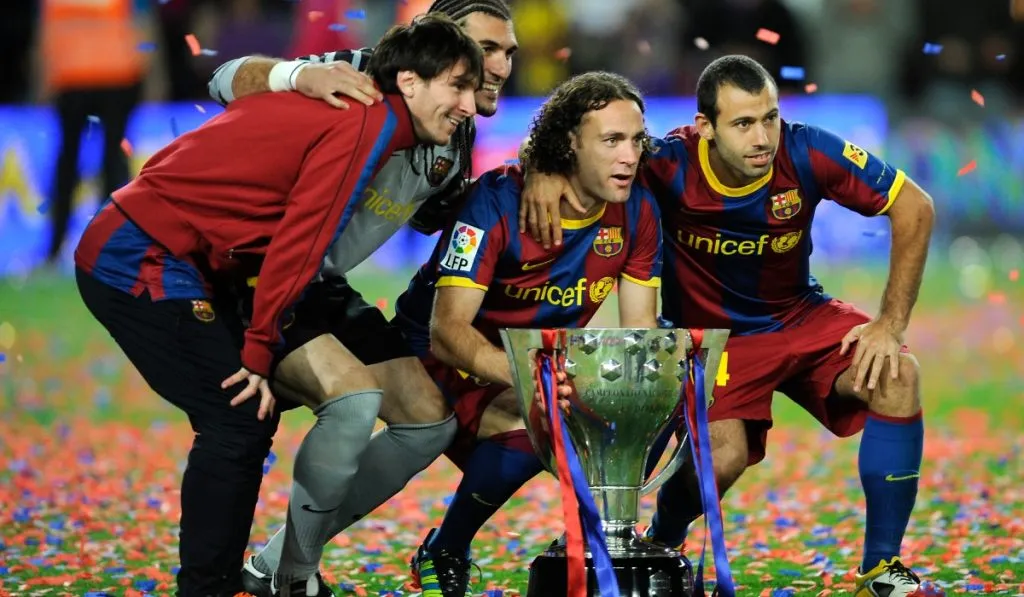 Javier Mascherano y Gabriel Milito junto a Lionel Messi en Barcelona: Getty Images