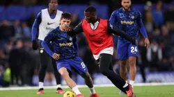 LONDON, ENGLAND - NOVEMBER 12: Enzo Fernandez and Moises Caicedo warm up prior to the Premier League match between Chelsea FC and Manchester City at Stamford Bridge on November 12, 2023 in London, England. (Photo by Ryan Pierse/Getty Images)