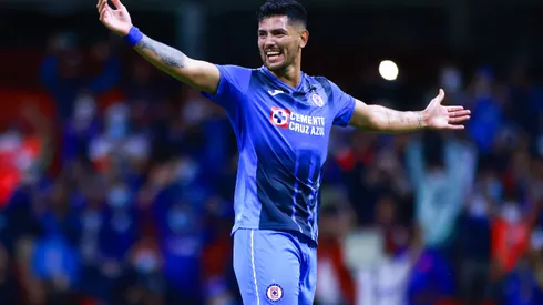 MEXICO CITY, MEXICO - SEPTEMBER 19: Lucas Passerini #18 of Cruz Azul celebrates after scoring the second goal of his team during the 9th round match between Cruz Azul and Queretaro as part of the Torneo Grita Mexico A21 Liga MX at Azteca Stadium on September 19, 2021 in Mexico City, Mexico. (Photo by Hector Vivas/Getty Images)