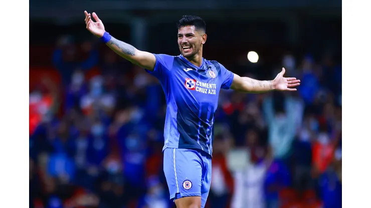 MEXICO CITY, MEXICO - SEPTEMBER 19: Lucas Passerini #18 of Cruz Azul celebrates after scoring the second goal of his team during the 9th round match between Cruz Azul and Queretaro as part of the Torneo Grita Mexico A21 Liga MX at Azteca Stadium on September 19, 2021 in Mexico City, Mexico. (Photo by Hector Vivas/Getty Images)
