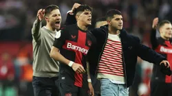 LEVERKUSEN, GERMANY - FEBRUARY 06: Piero Hincapie, Exequiel Palacios and Xabi Alonso of Bayer Leverkusen celebrates following the team's victory in the DFB cup quarterfinal match between Bayer 04 Leverkusen and VfB Stuttgart at BayArena on February 06, 2024 in Leverkusen, Germany. (Photo by Lars Baron/Getty Images)