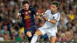 Lionel Messi y Cristiano Ronaldo en uno de sus Clásicos por LaLiga.