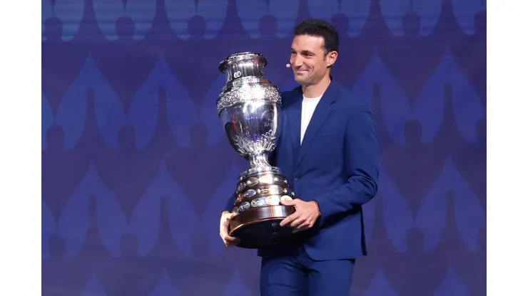 MIAMI, FLORIDA - DECEMBER 07: Lionel Scaloni, Head Coach of Argentina, presents the Copa America trophy during the official draw of CONMEBOL Copa America 2024 at James L. Knight Center on December 07, 2023 in Miami, Florida. (Photo by Eva Marie Uzcategui/Getty Images)