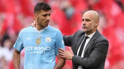 Rodri y Pep Guardiola, jugador y entrenador del Manchester City.