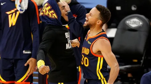 Jordan Poole y Stephen Curry