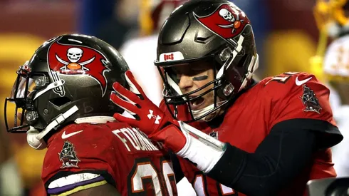 Leonard Fournette y Tom Brady