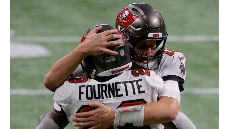 Leonard Fournette y Tom Brady