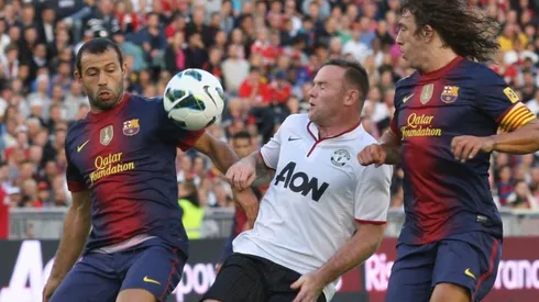 Javier Mascherano y Carles Puyol, juntos en Barcelona.