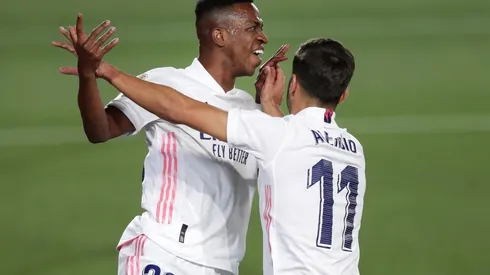 Vinicius Junior y Marco Asensio celebrando un gol del Real Madrid esta temporada (Getty Images).