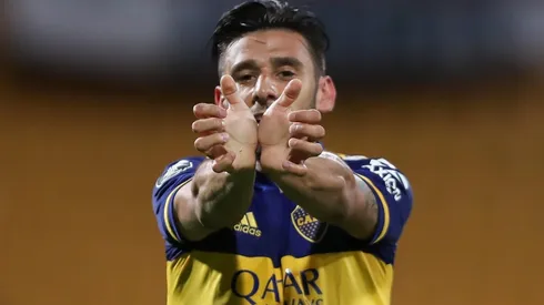 Eduardo Salvio y uno de sus festejos.