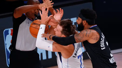 Luka Doncic y Marcus Morris (Getty Images)