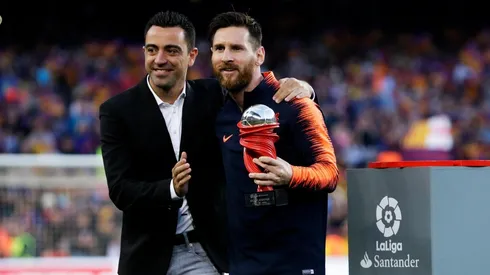 Foto de Xavi junto a Leo Messi.