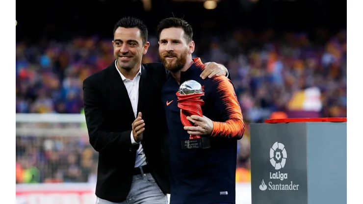 Foto de Xavi junto a Leo Messi.