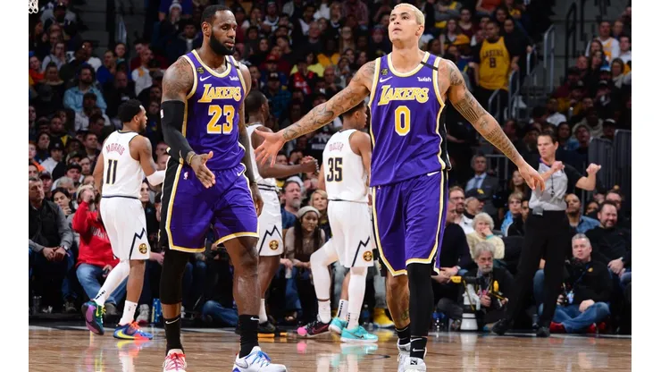 LeBron James junto a Kyle Kuzama (Getty)