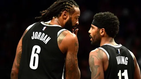 DeAndre Jordan y Kyrie Irving (Getty Images)
