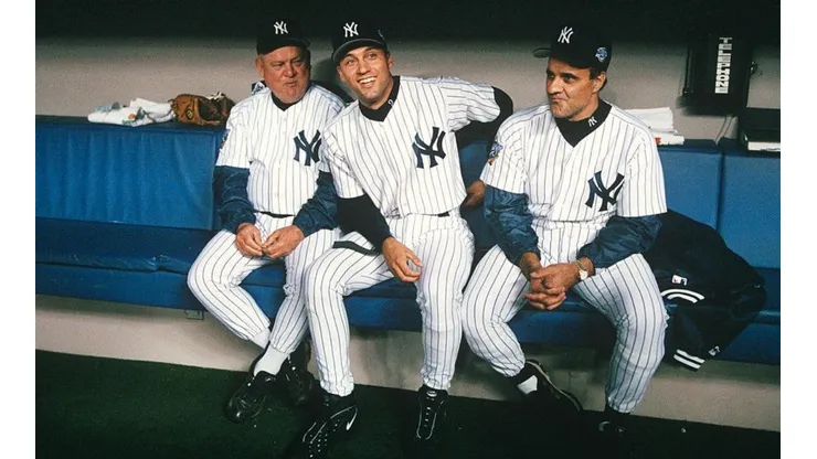 Derek Jeter (centro) y Joe Torre (der.) (Getty Images).