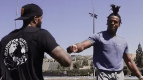 Odell Beckham Jr. y Cam Newton. Foto: captura de pantalla.