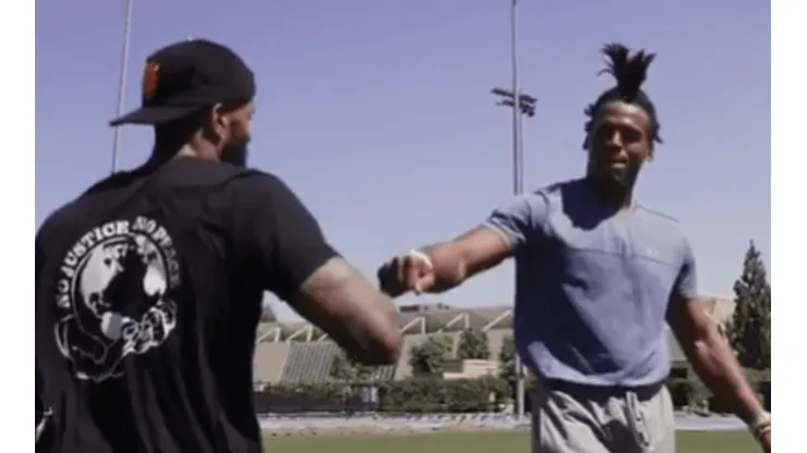 Odell Beckham Jr. y Cam Newton. Foto: captura de pantalla.
