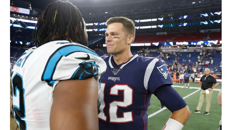 Gerald McCoy con Tom Brady.