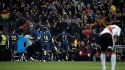 Foto de los jugadores de Boca celebrando el gol de Dario Benedetto.