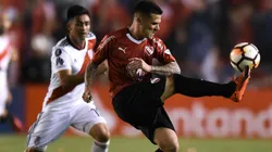 Fabricio Bustos en un partido contra River.