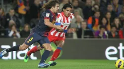 Carles Puyol y Radamel Falcao.