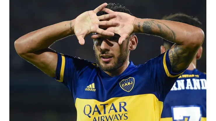 Eduardo Salvio y uno de sus festejos.