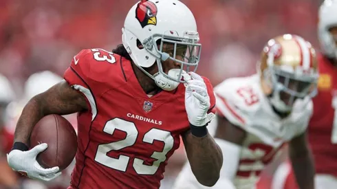 Excorredor de la NFL es acusado de pagar por un asesinato