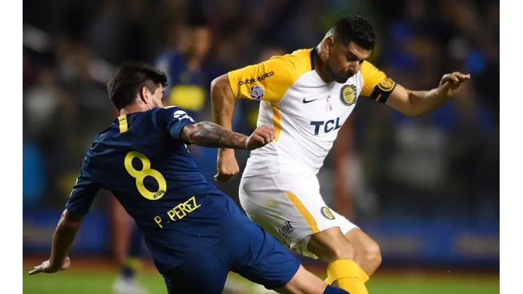Néstor Ortigoza enfrentando a Boca Juniors.