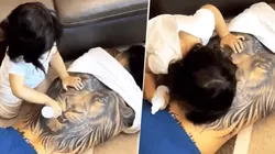 Driussi subió video de su hija "alimentando" al león que tiene en la espalda