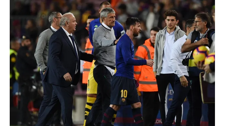 Foto del entrenador de Lionel Messi con él.