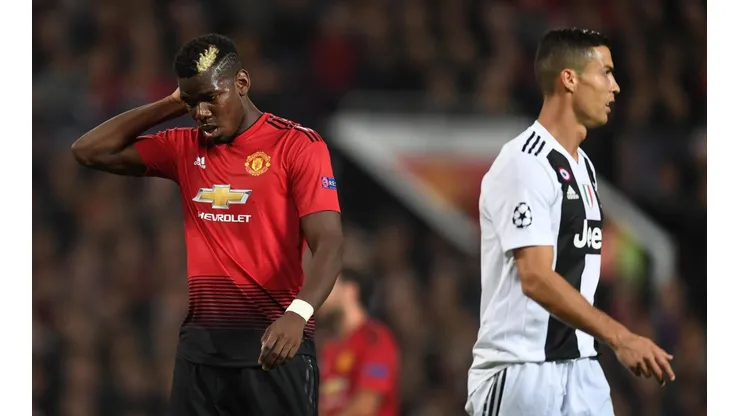 Paul Pogba y Cristiano Ronaldo en un enfrentamiento.