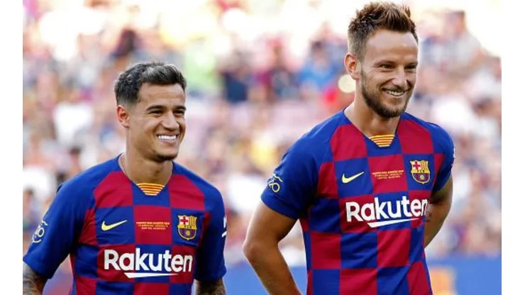 Foto de Coutinho con Rakitic.
