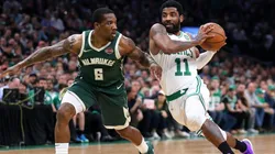 Kyrie Irving ataca el aro perseguido por Eric Bledsoe