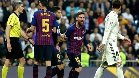 DOS VECES, SERGIO. Messi se encara con Ramos, quien le había dado un codazo (Foto: Getty).