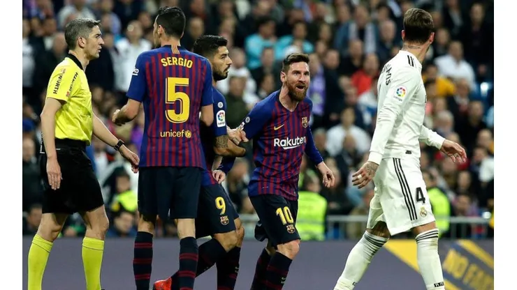 DOS VECES, SERGIO. Messi se encara con Ramos, quien le había dado un codazo (Foto: Getty).