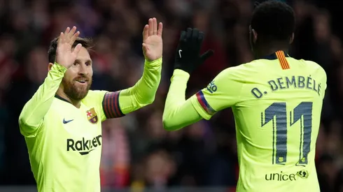 Messi y Dembélé celebrando un gol.