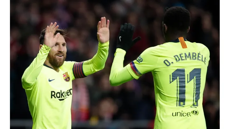 Messi y Dembélé celebrando un gol.