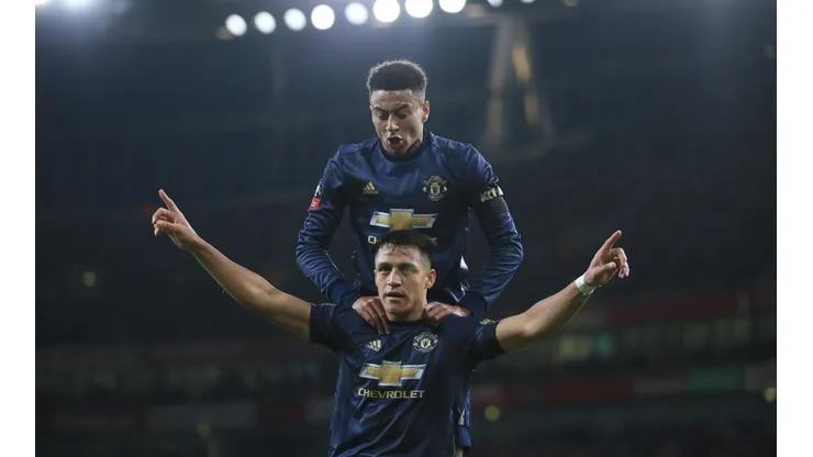Alexis Sánchez y Jesse Lingard (Foto: Getty)