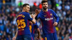 Vermaelen junto a Piqué.