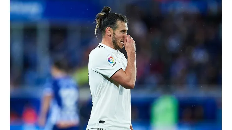 NO PUEDE RESPIRAR. Gareth Bale en el fondo del mar junto al Real Madrid (Foto: Getty).