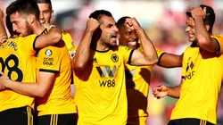 Foto de los jugadores celebrando un gol.