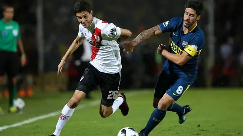 SE VIENE EL SUPERCLÁSICO. Ignacio Fernández y Pablo Pérez en el último Boca-River (Foto: Getty).