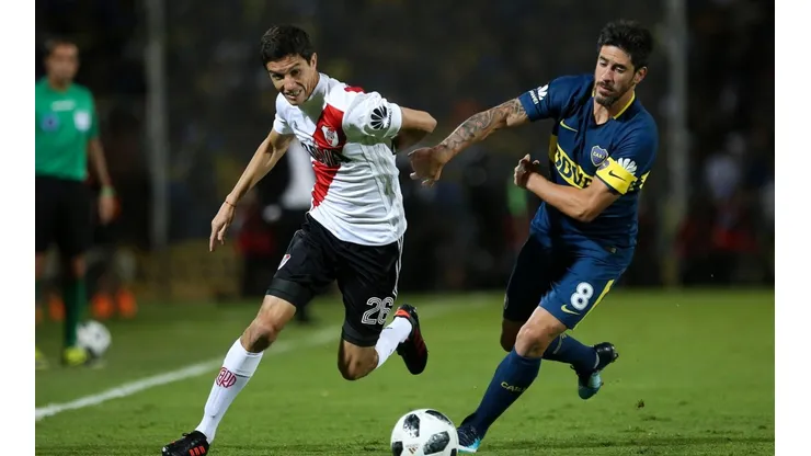 SE VIENE EL SUPERCLÁSICO. Ignacio Fernández y Pablo Pérez en el último Boca-River (Foto: Getty).